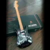 Picture of Jimi Hendrix™ Mini Fender™ Strat™ Tribute Guitar Model Photograph by Richard Peters / Copyright Authentic Hendrix